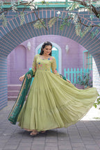 WOMEN'S GREEN FAUX GEORGETTE GOWN WITH RUSSIAN SILK DUPATTA WITH ADORABLE EMBROIDERED THREAD WORK STITCHED