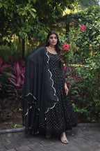 Women's FAUX GEORGETTE PARTY WEAR GOWN IN BLACK AND GREY WITH SEQUENCE WORK STITCHED