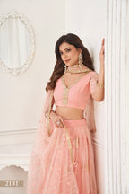 WOMEN'S PEACH BUTTERFLY NET WITH SEQUINS AND EMBROIDERY WORK LEHENGA CHOLI FOR PARTY WEAR